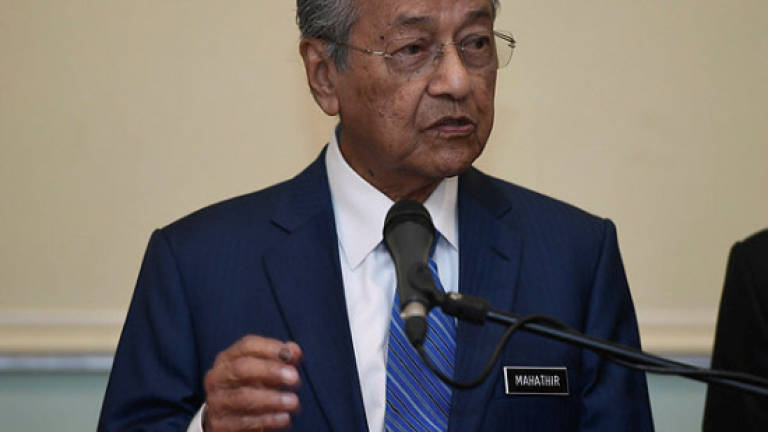 Tun M worried about job losses from planned Telenor, Axiata merger