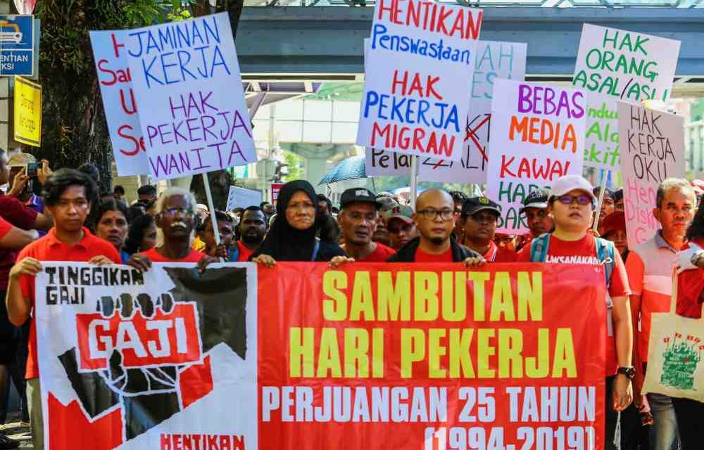 At May Day gathering, workers demand better pay and fairer treatment
