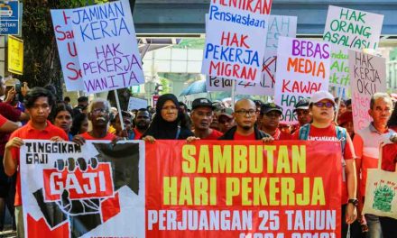 At May Day gathering, workers demand better pay and fairer treatment